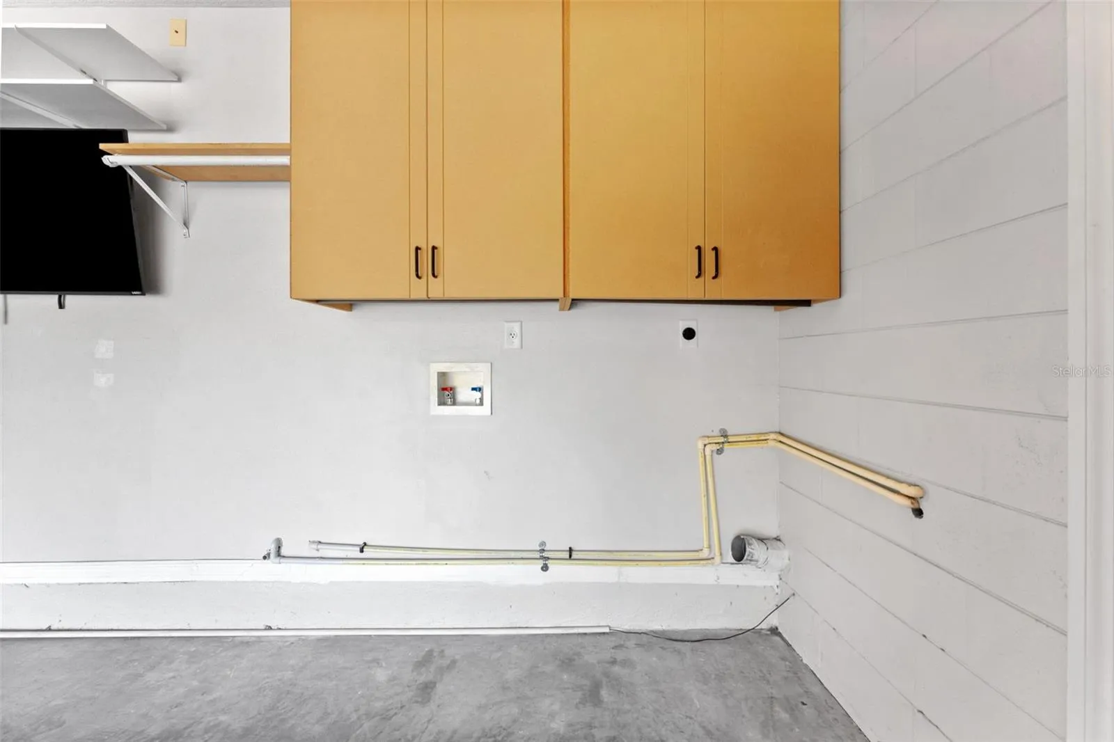 Laundry room in garage