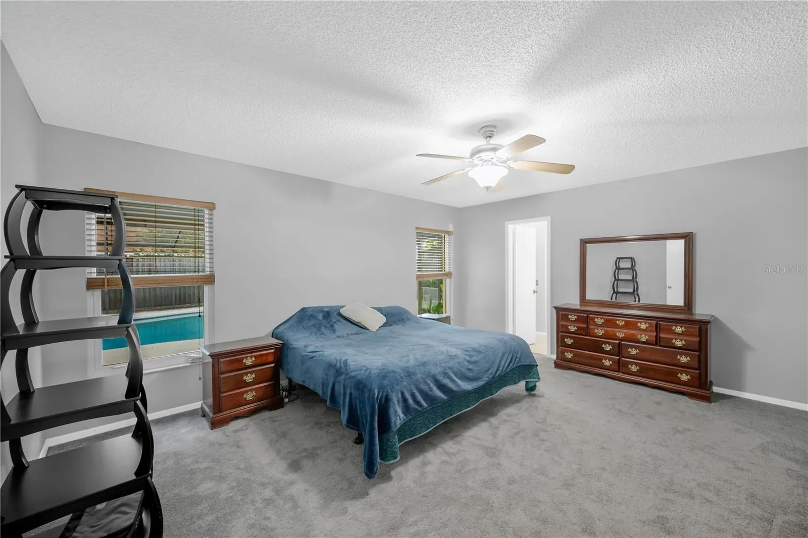 Spacious first-floor Owner’s Suite with an ensuite bathroom and two separate walk-in closets.