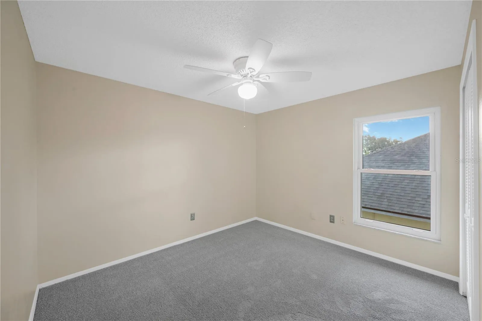 Bedroom #2 Has a built-in closet, Updated carpet in 2023 and a ceiling fan.