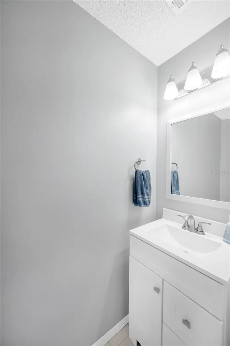 There is a convenient half bathroom on the first floor for guests.