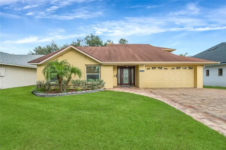 Numerous improvements offer added peace of mind, including impact windows (2018), roof (2018), upgraded A/C (2017), hot water heater (2020), kitchen remodel (2023), second-floor bathroom remodel (2023), upstairs carpet (2023), downstairs carpet (2024), upgraded pool pump (2026), and first-floor toilet replacement (2026). The pool and spa are heated by propane, and the home also features a water softener and security system.
