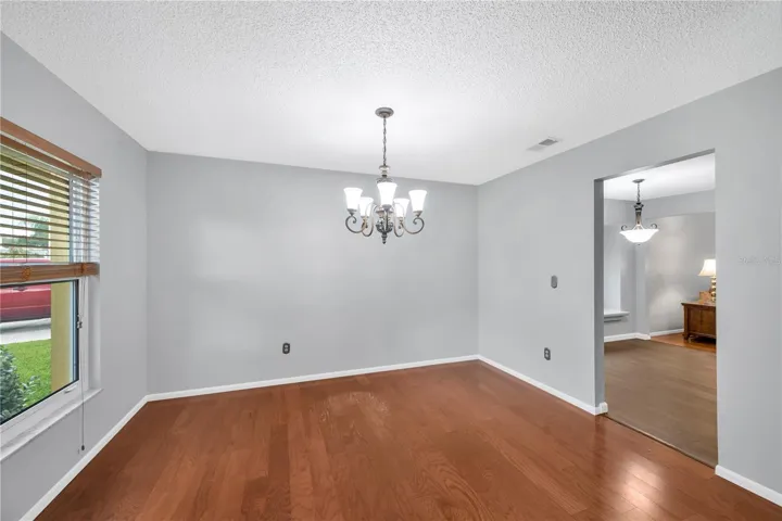 Dining room has plenty of room to gather your family for holiday meals.