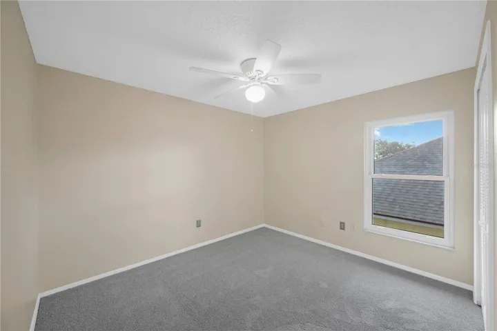 Bedroom #2 Has a built-in closet, Updated carpet in 2023 and a ceiling fan.