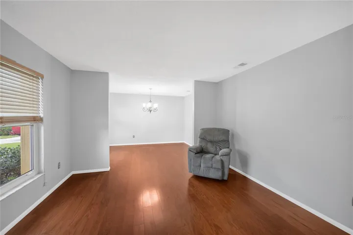 To the left of the foyer is a living room / dining room for effortless entertaining.