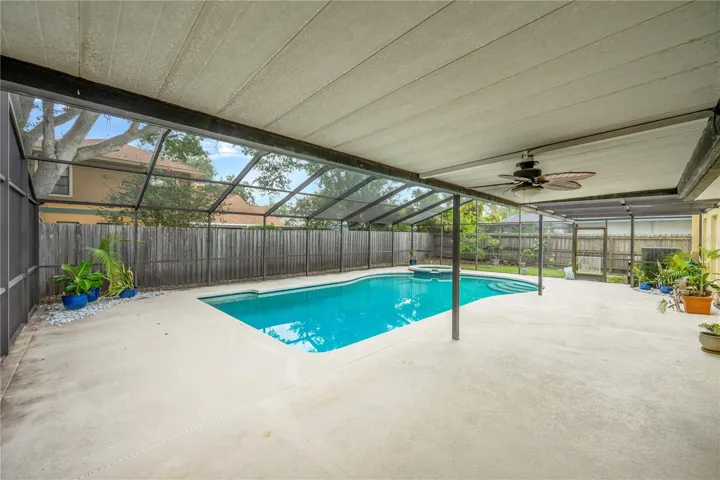 There is a large covered area for outdoor furniture and shade.