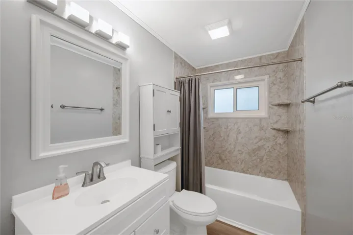 Upstairs shared 4-piece bathroom with a tub/shower was remodeled in 2023.combination.
