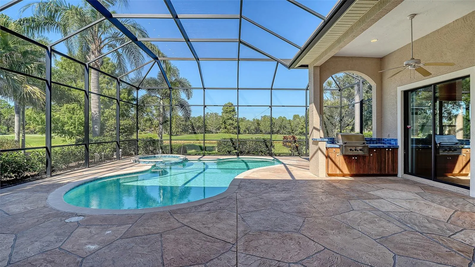 Resort style pool with self cleaners and pebbletec