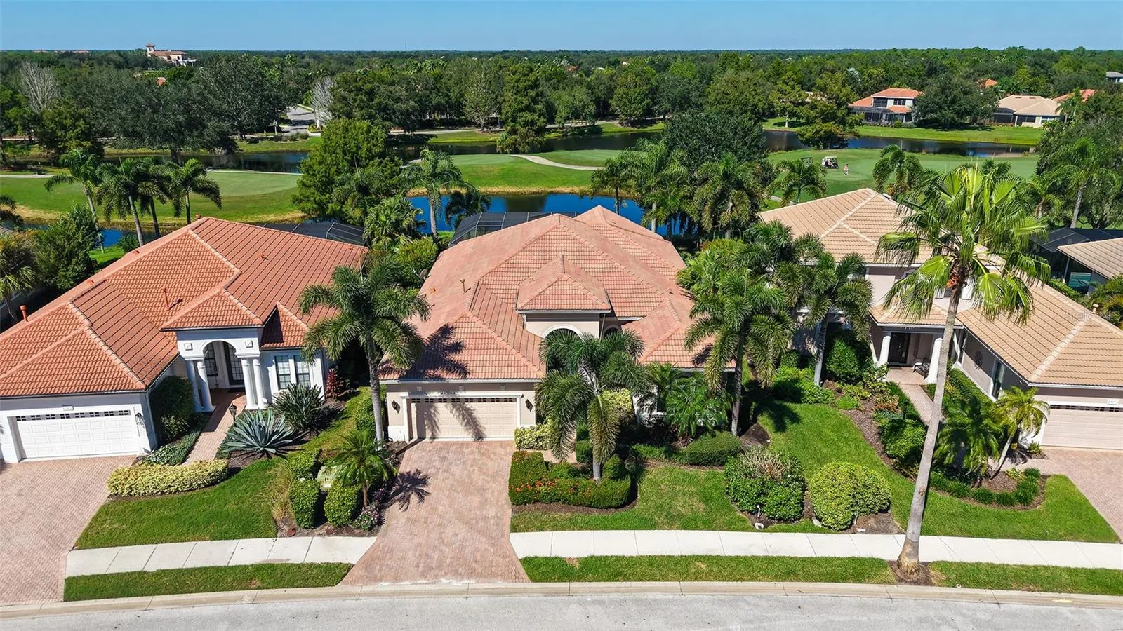 Set on a gorgeous lake and golf course view lot.