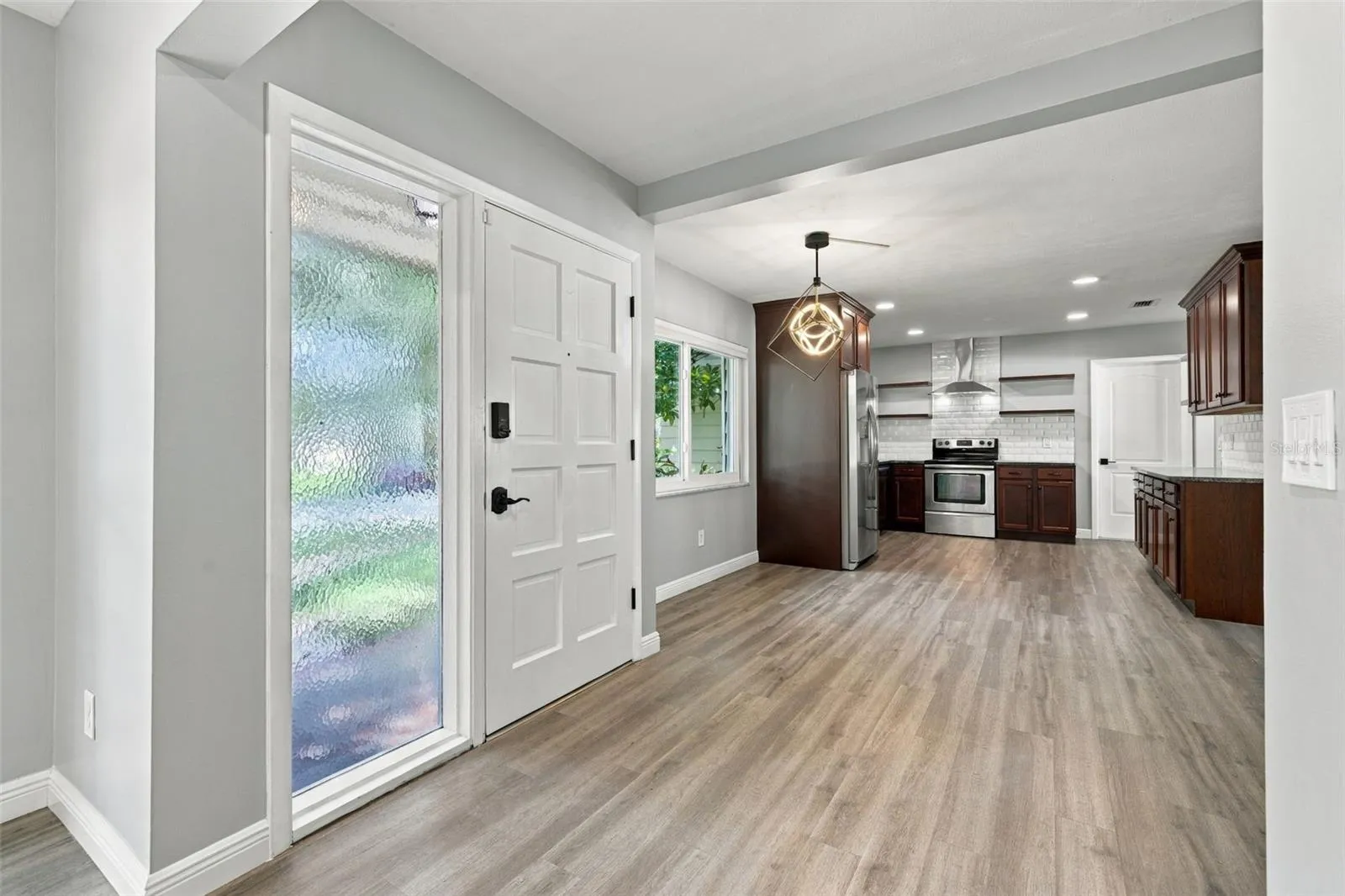 This home gets plenty of natural light and has a great floor plan with 3 bedrooms and a bonus room with fireplace!
