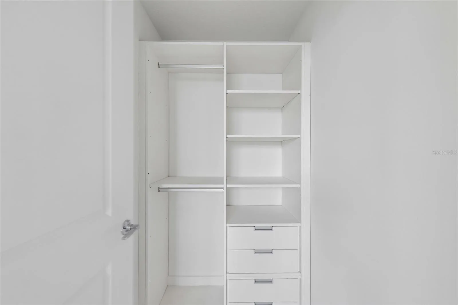 Primary bedroom with built-in closet