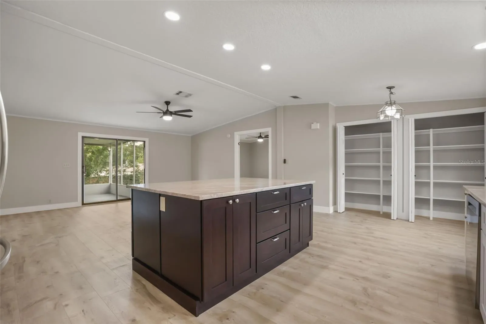 Island with Quartzite Countertops and Pull Out Drawers