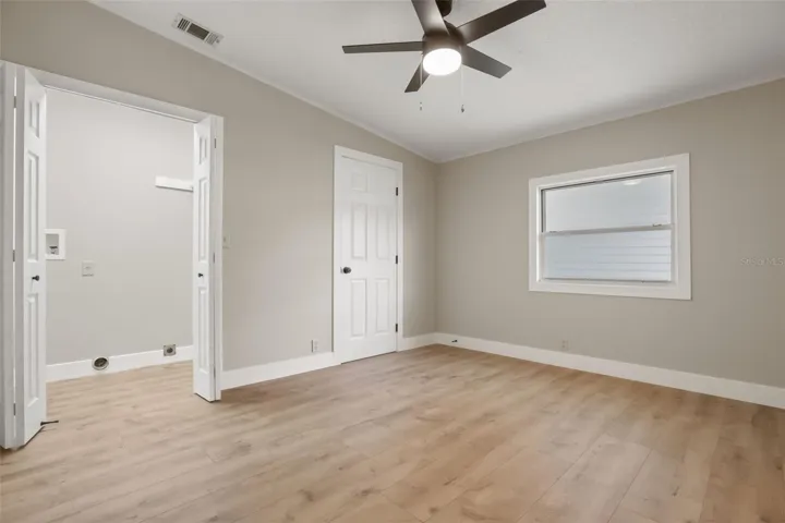 Double closet has Washer/Dryer Hookup and Closet Rod