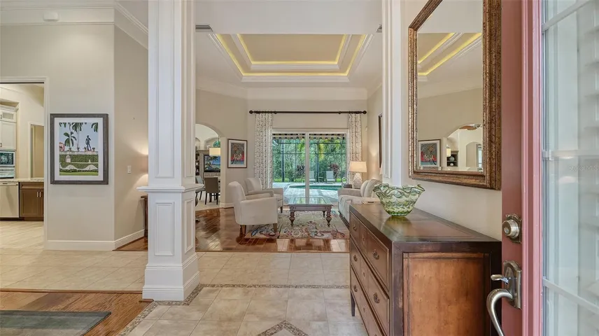 welcoming foyer with tile inlay