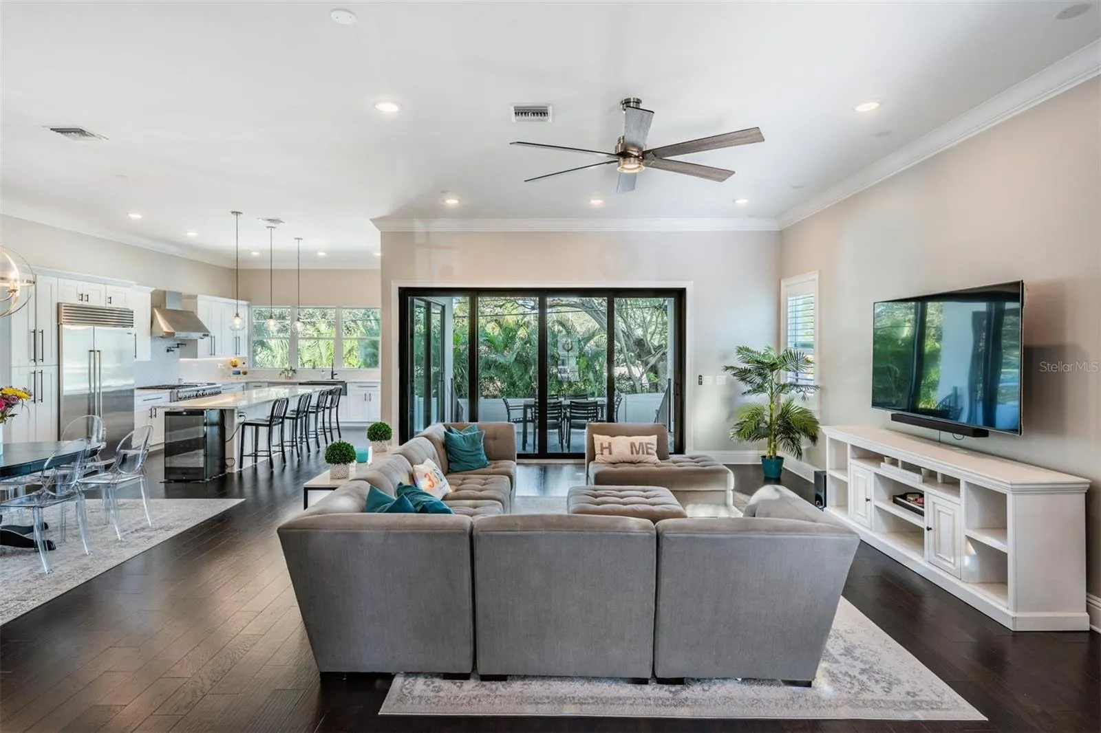 Soaring ceilings and an open layout offer functional living space.