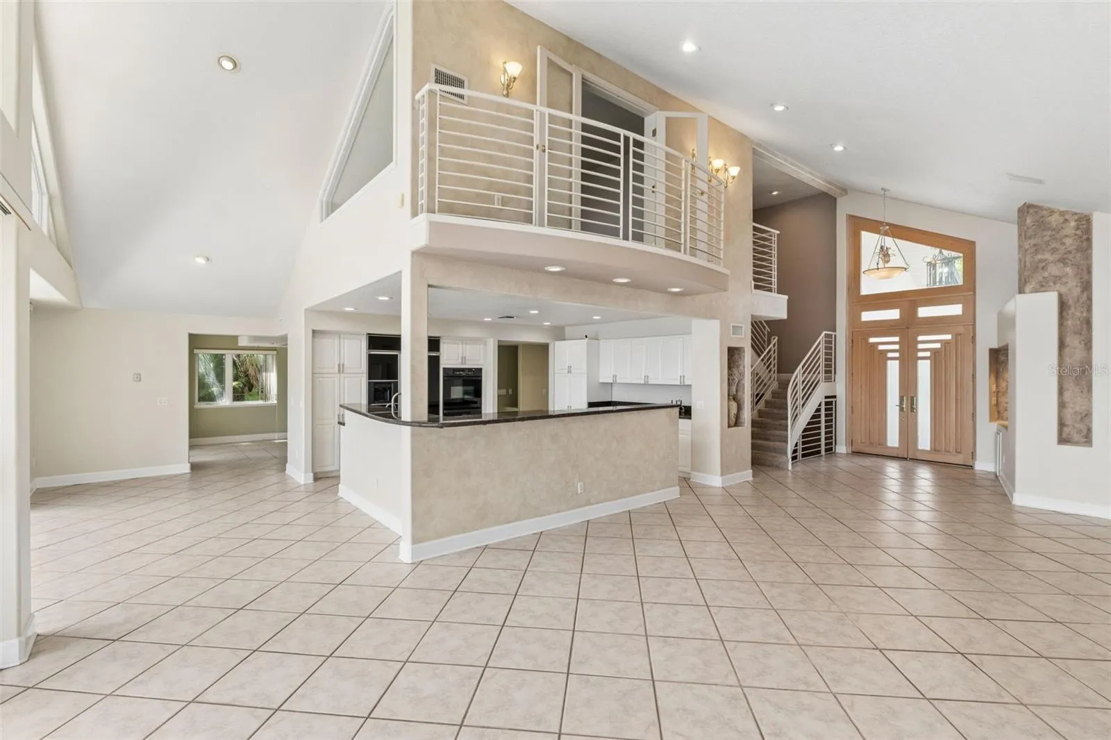 Living Room overlooking the kitchen, and Office above the kitchen.