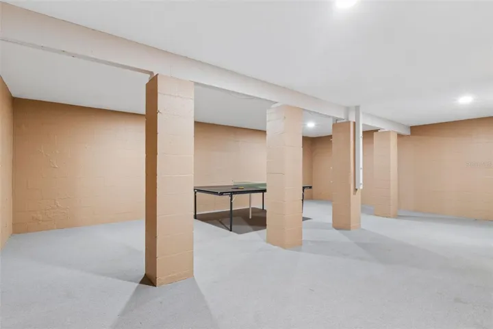 Secure basement safe room ideal as a shelter, game room, music room, or additional flex space.