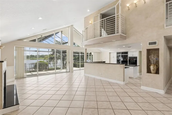 Living Room overlooking the kitchen, and office above