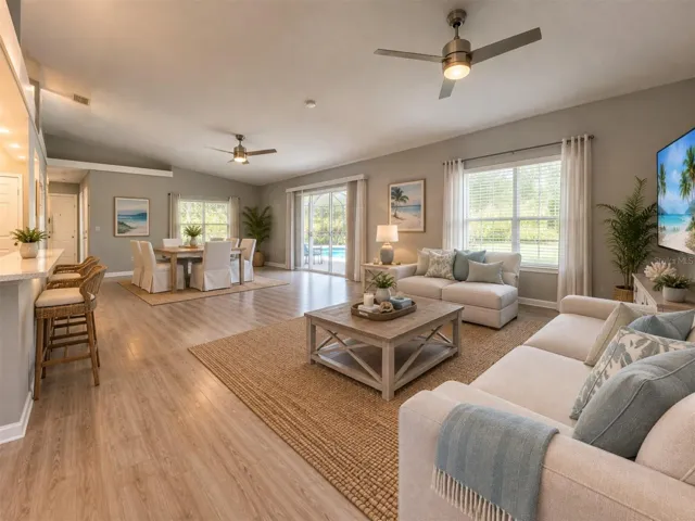 Living Dining room combo overlooking pool