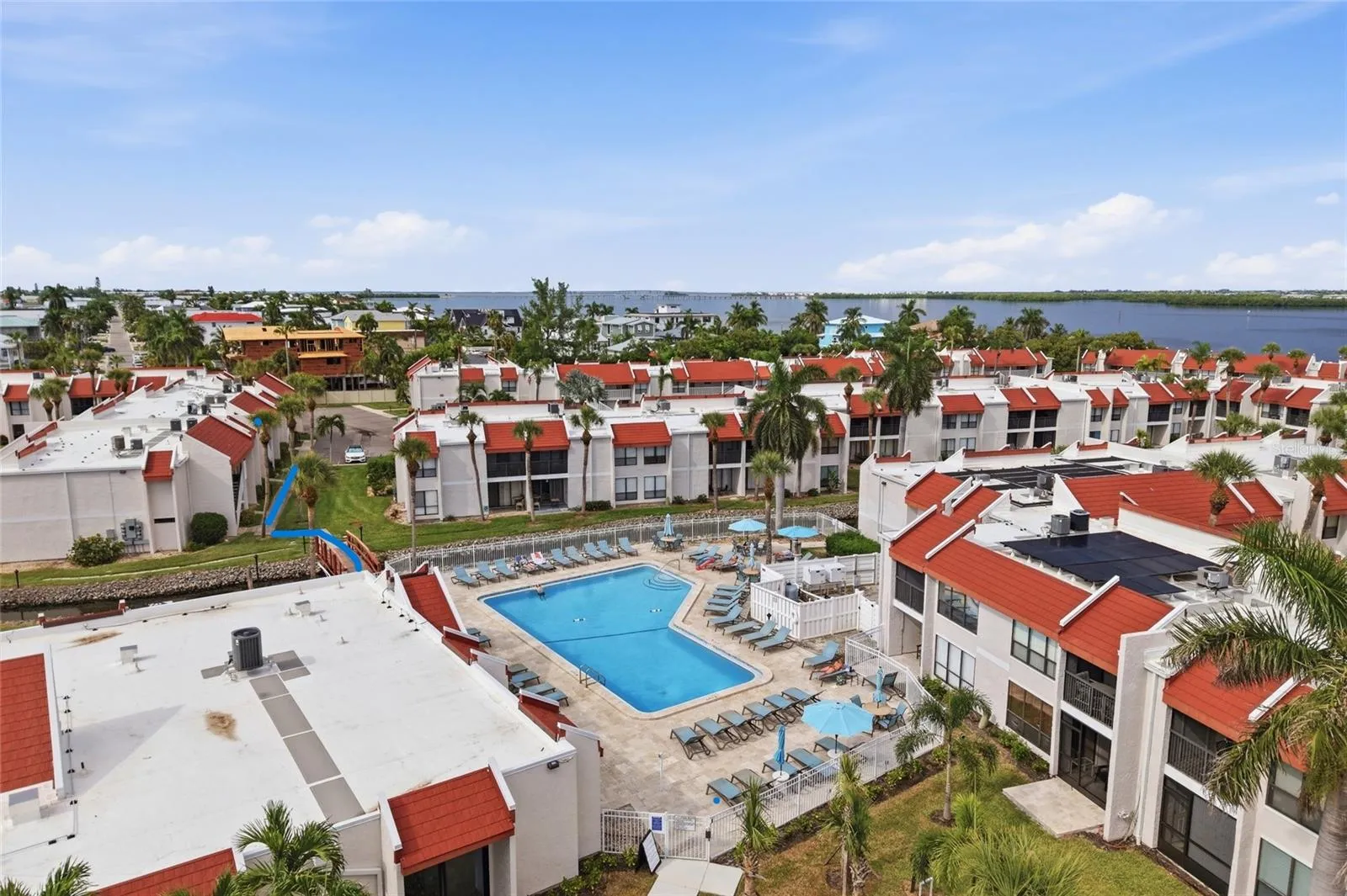 25 Steps from Condo to the Largest Heated Saltwater Pool on Anna Maria Island.