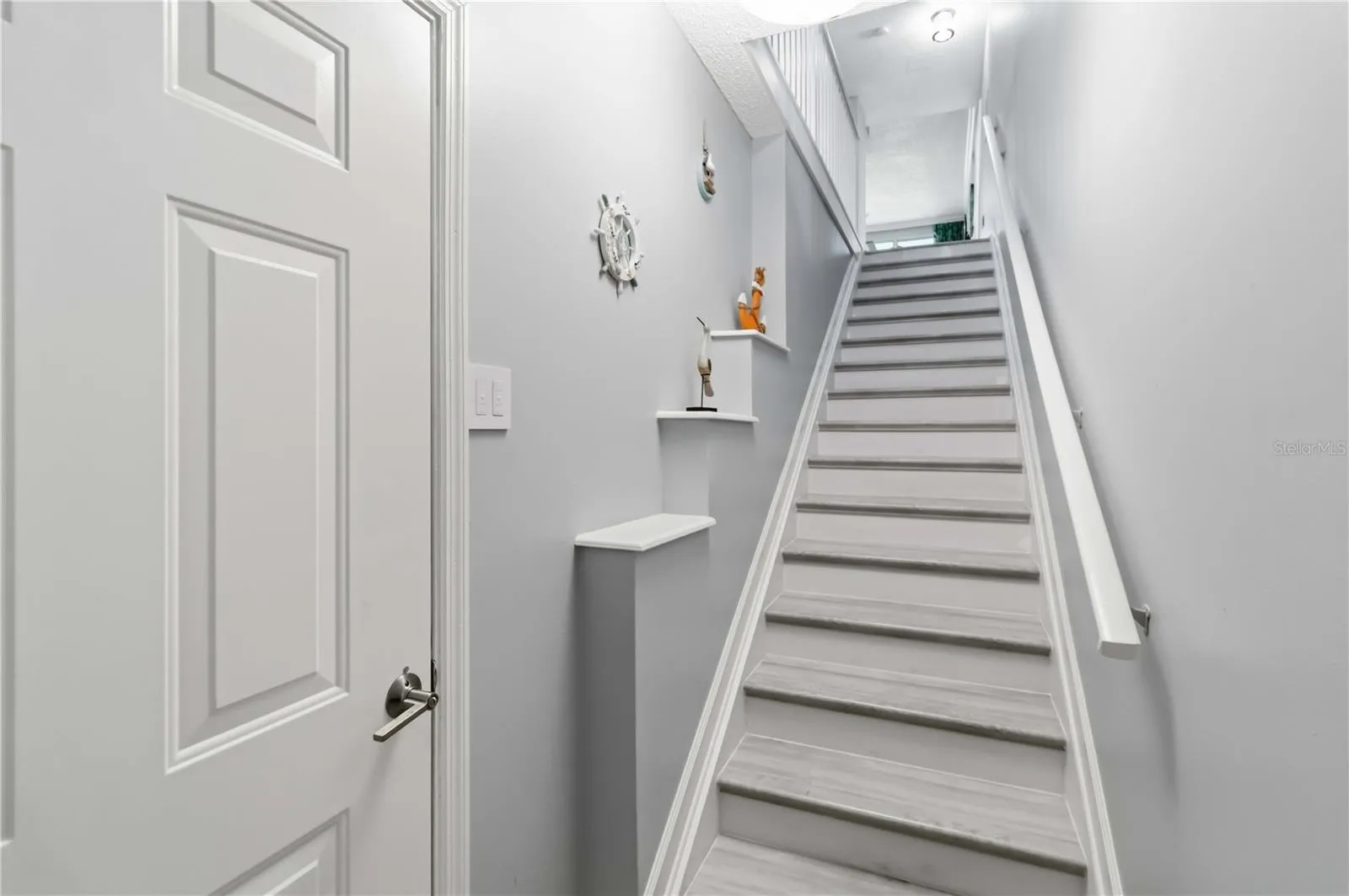 Enter up one flight of stairs and enjoy the convenience of a single-level living space.