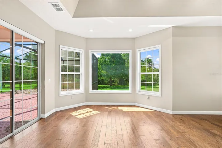 Primary Bedroom sitting area with view back private garden