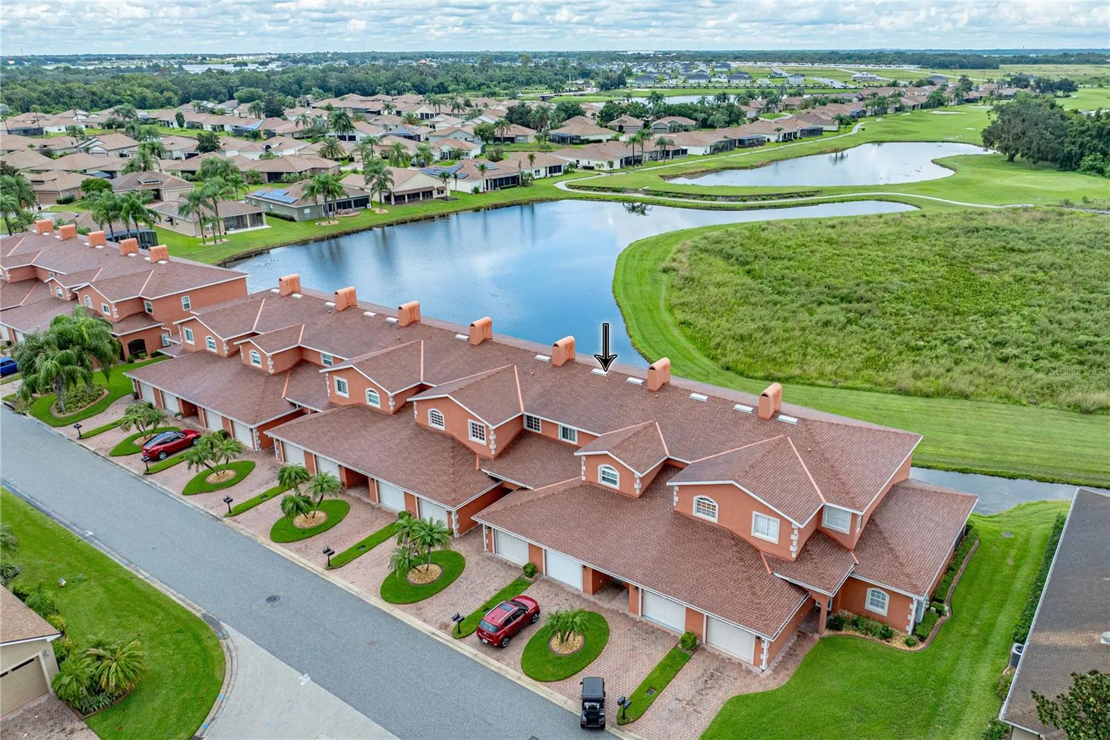 The rear of this condo unit backs up to a large pond with views of golf course, nature preserve, and woods.