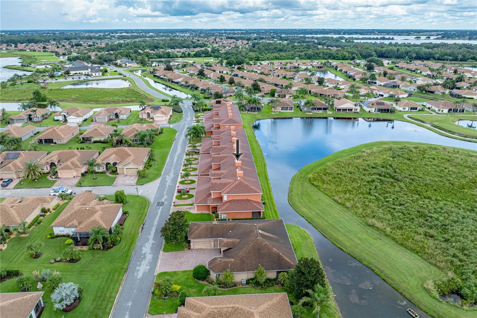 The condo is on a quiet dead end street and and is close to the main clubhouse which can be seen in the background.