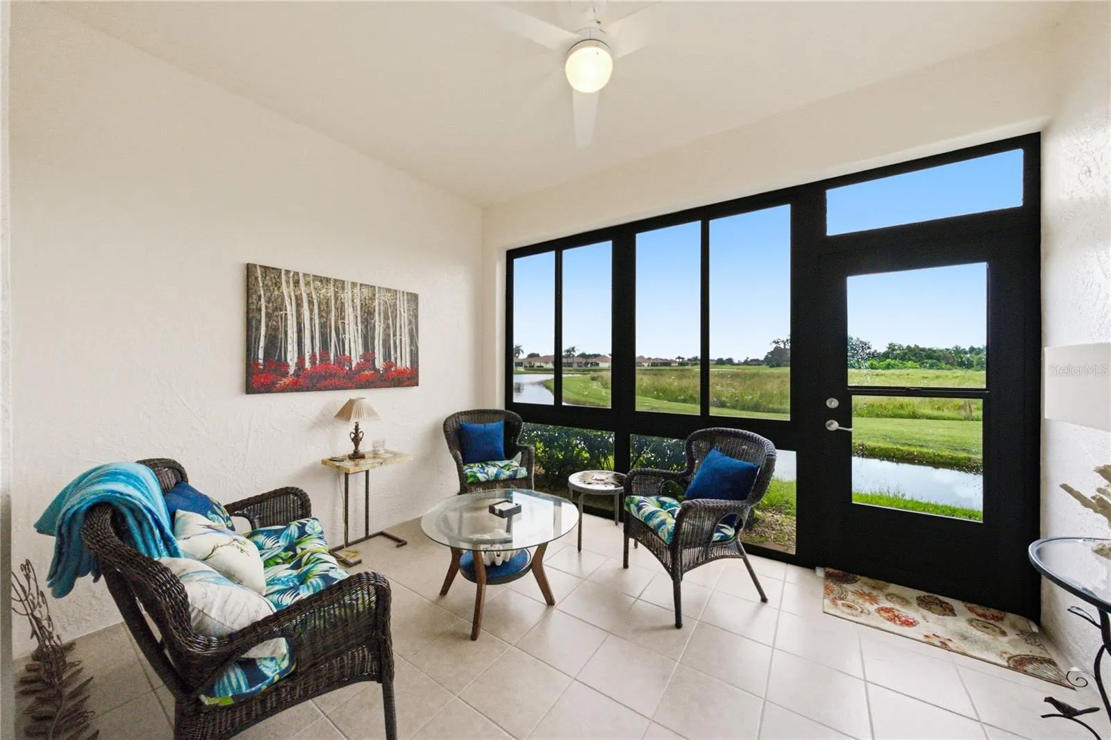 The enclosed lanai has slider windows with screens, both of which can be removed.