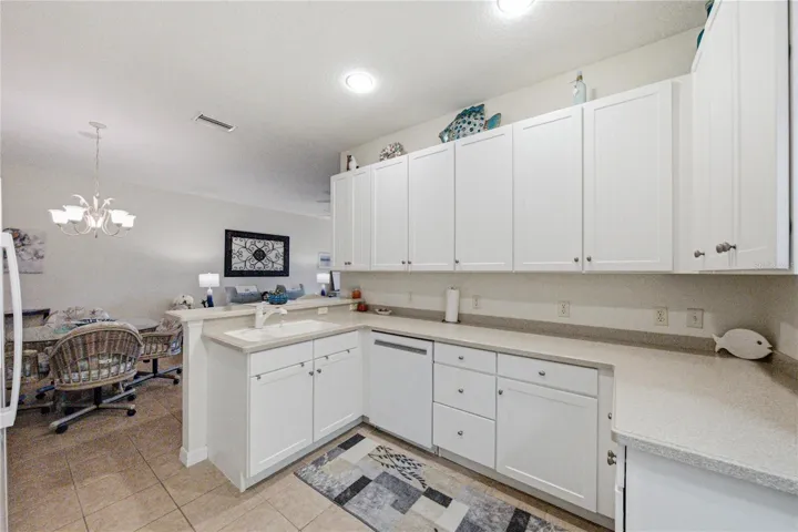The kitchen has a handy snack bar for those informal meals.