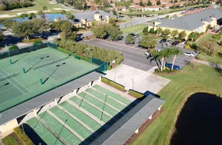 The main clubhouse grounds include lighted shuffleboard, tennis and an outdoor basketball courts.