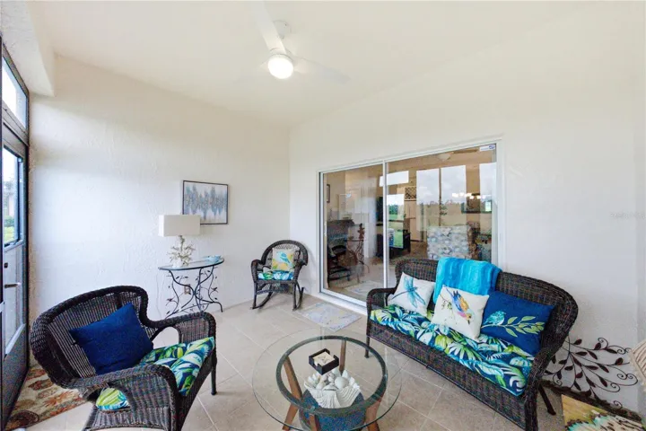 Access to the enclosed lanai is through the double slider in the living room.