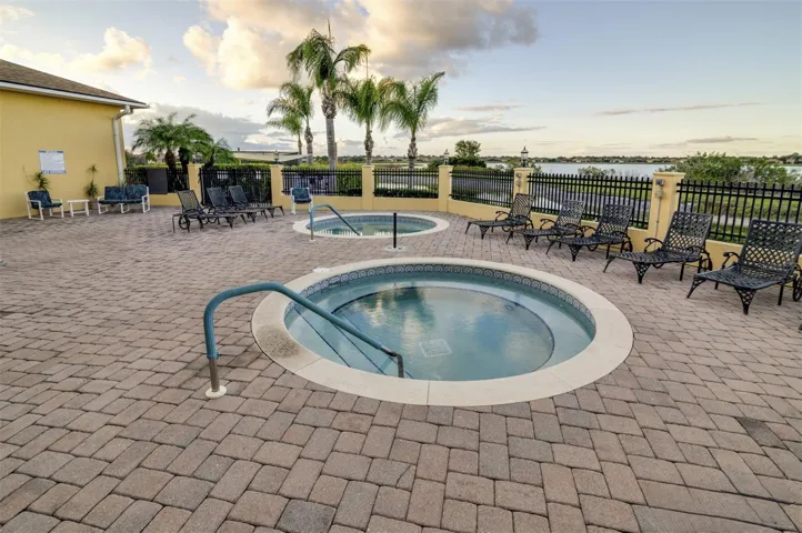 The spa patio is just outside the indoor pool.