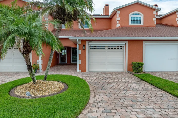 This lower-level condo has 2 bedrooms and 2 baths. The garage has a powered roll-up garage door screen.