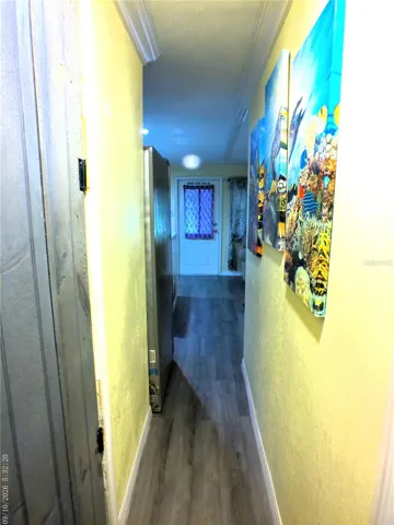 HALLWAY VIEW FROM BEDROOMS. BATHROOM ON LEFT