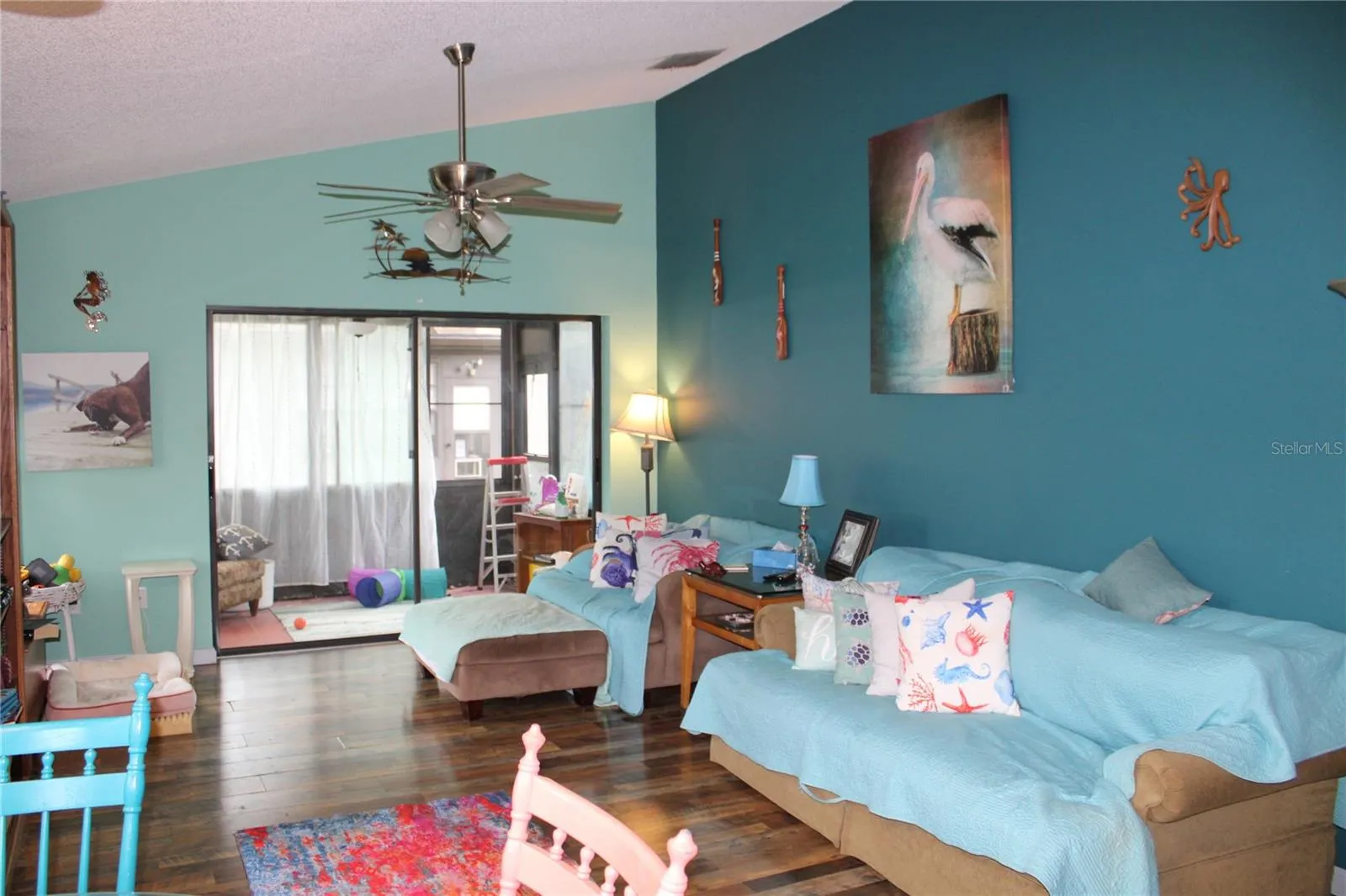 Big living room with cathedral ceilings.