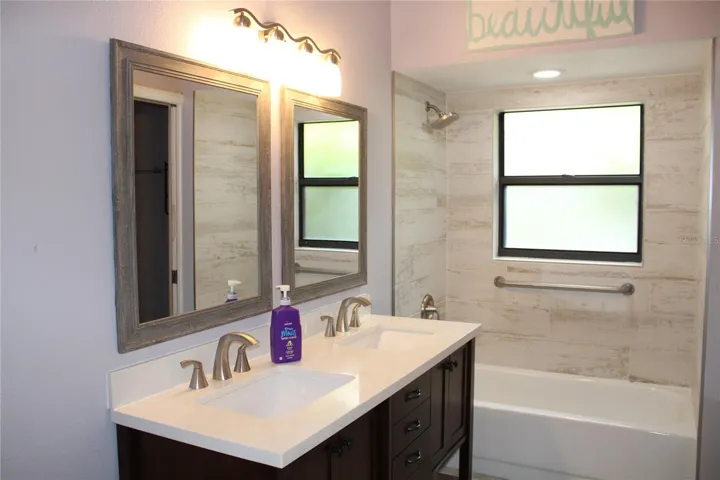 Primary bathroom has bathtub and separate shower