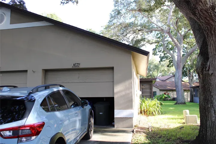 Private garage with electric door opener.