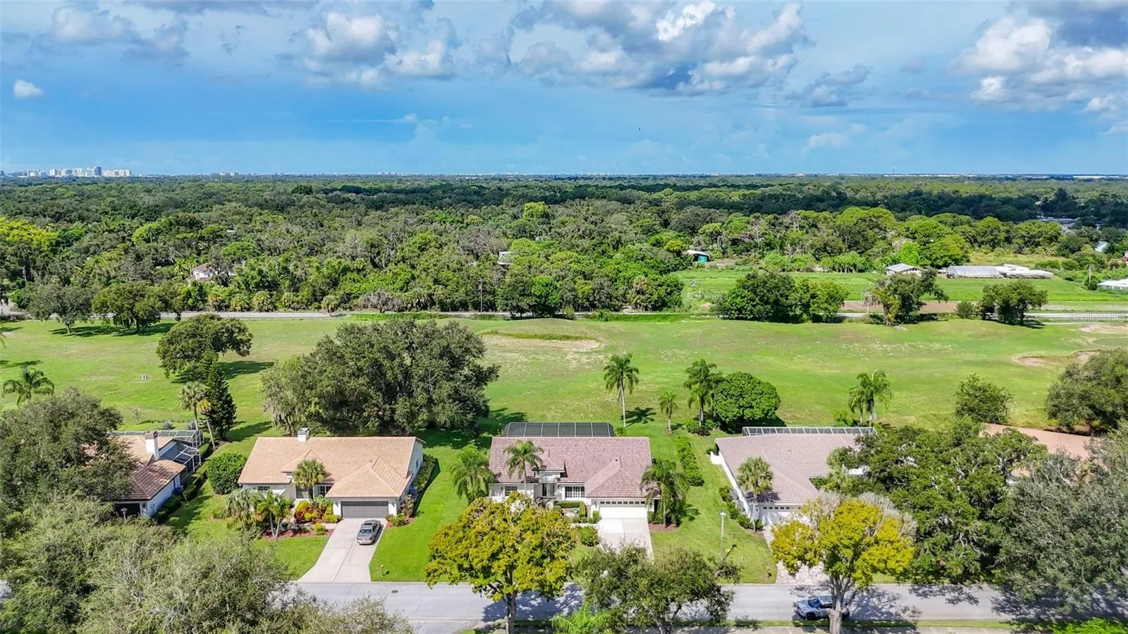Birds eye view of golf course backyard.