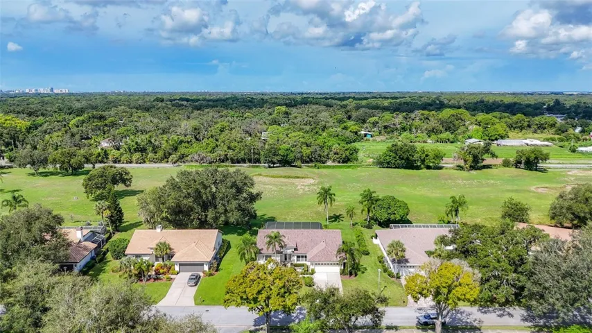 Birds eye view of golf course backyard.