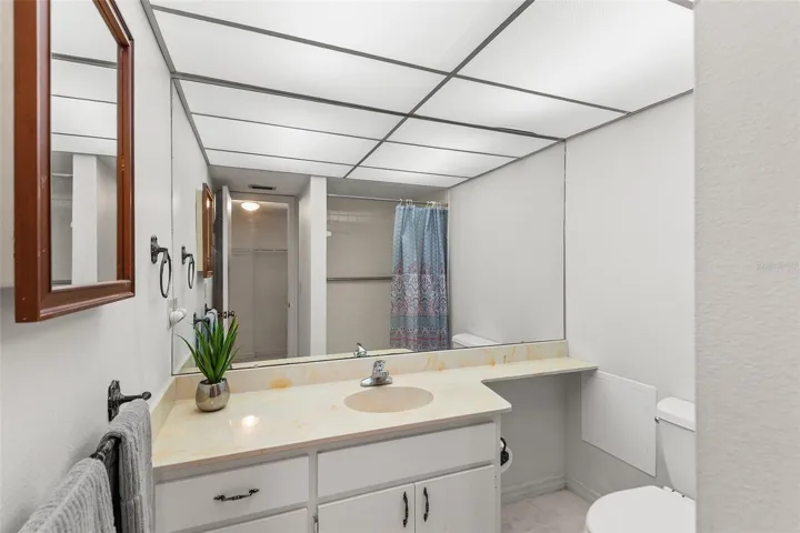 PRIMARY BATHROOM. REFLECTION OF SHOWER IN MIRROR!