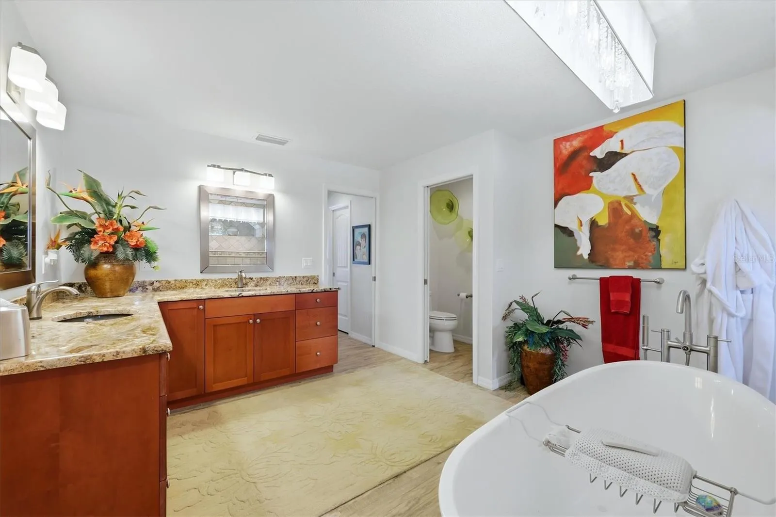 Separate water closet dual sinks
