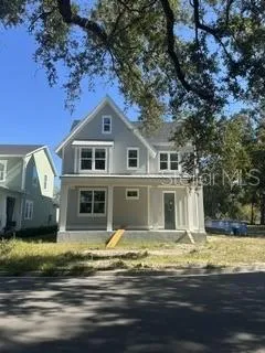 Front elevation - covered porch, corner homesite