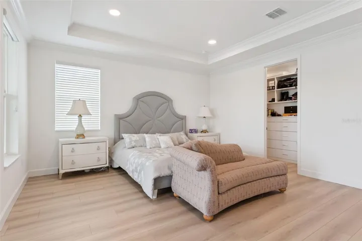 Primary Suite 1 of 2 custom walk-in closets