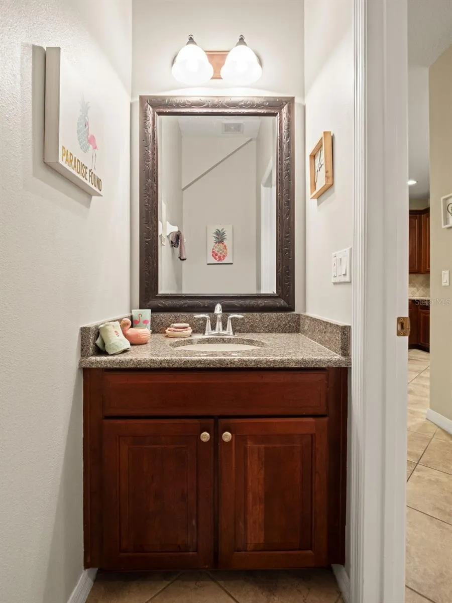 downstaris half bathroom off of foyer