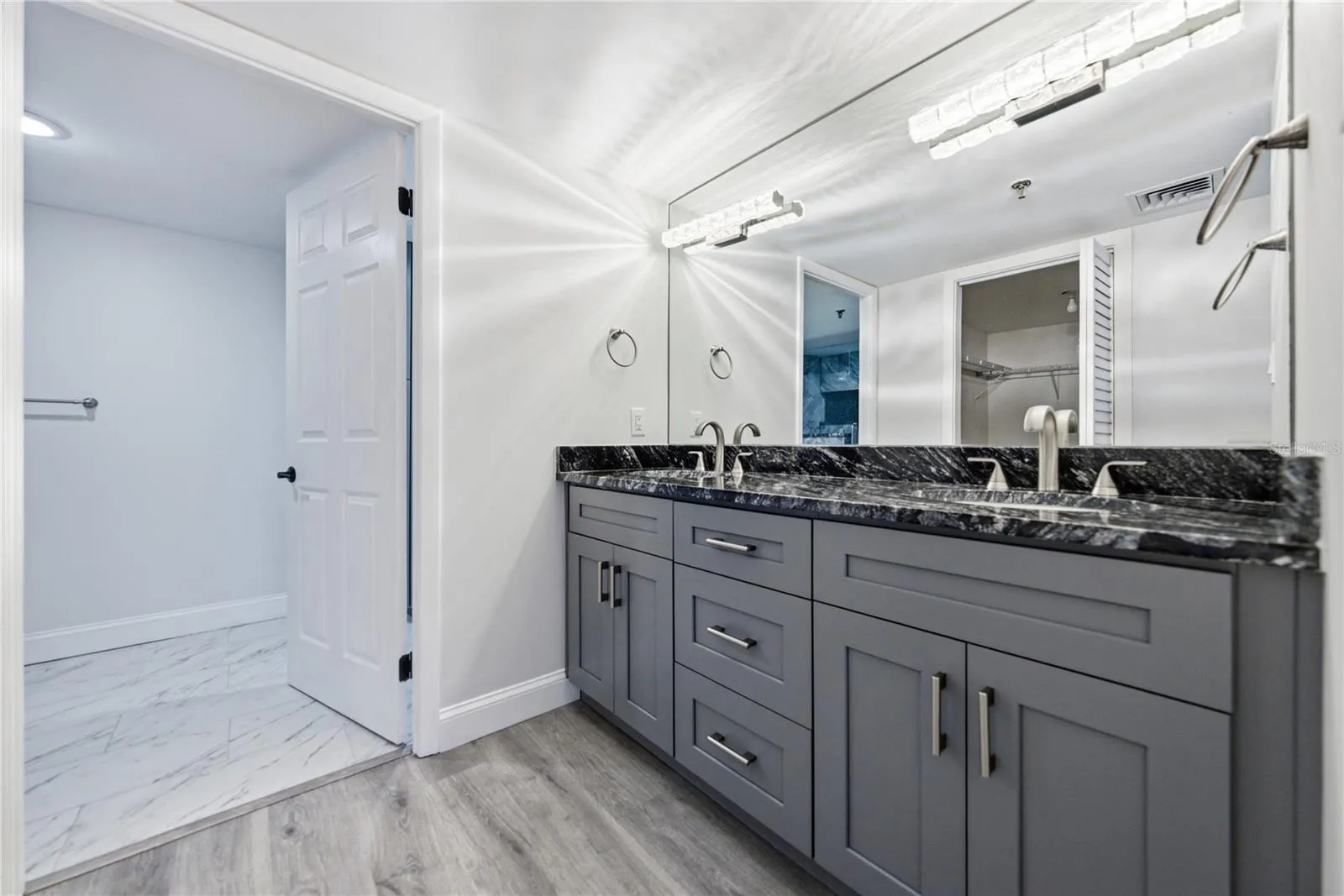 Primary bathroom with dual vanity