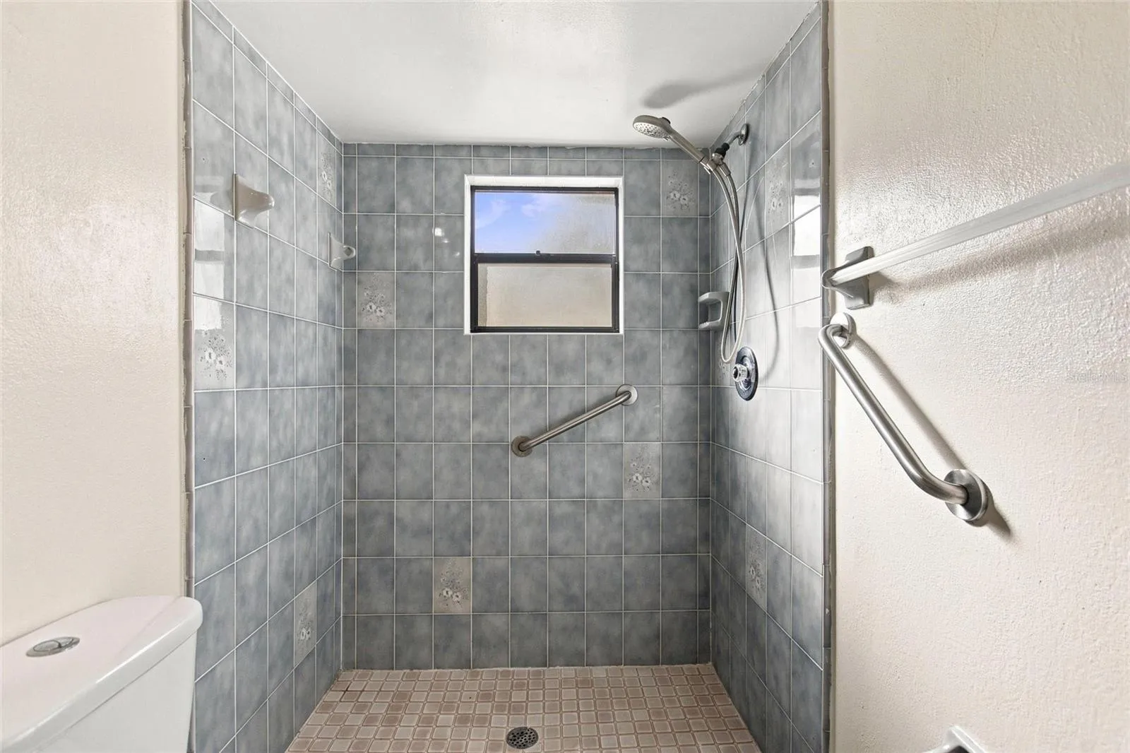 UPDATED TILED SHOWER