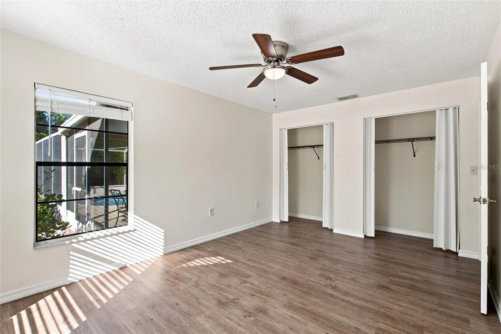 PRIMARY BEDRROM WITH POOL VIEWS -GREAT FOR YOUR MORNING COFFEE IN BED
