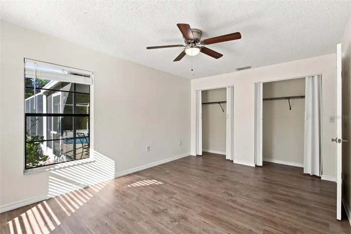 PRIMARY BEDRROM WITH POOL VIEWS -GREAT FOR YOUR MORNING COFFEE IN BED