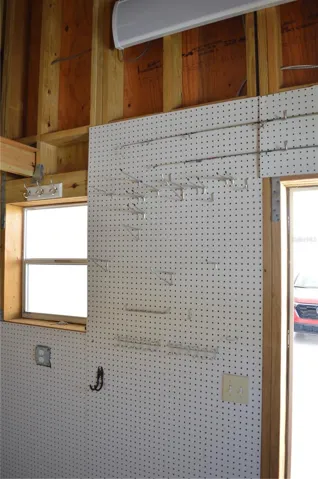 shed also has pegboard for tool organization
