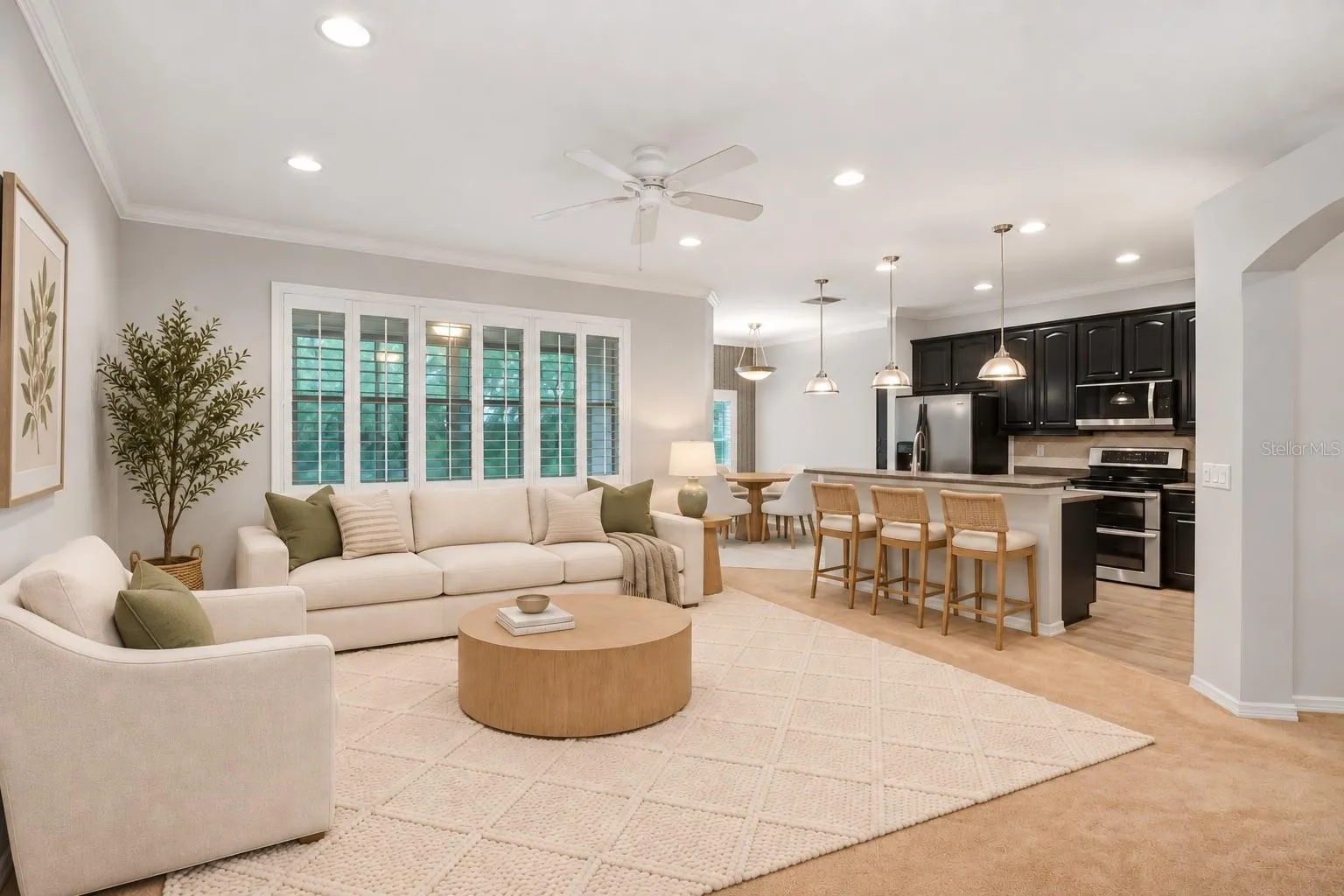 Family Room with Kitchen Combo.  New windows and Plantation Shutters throughout